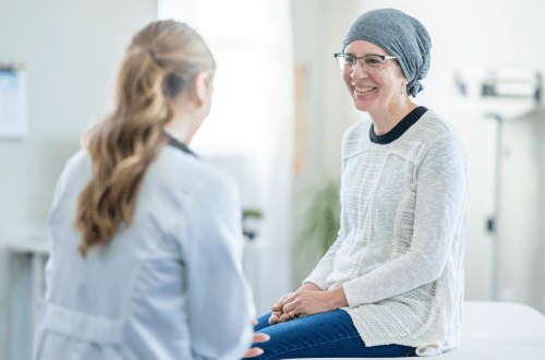 Imagine of a female cancer patient and a female Dr. representing Innovative Trial Designs in Early-Phase Oncology Research