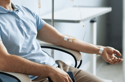 Patient receiving immune checkpoint inhibitor drug during early-phase oncology trial for advanced solid tumors